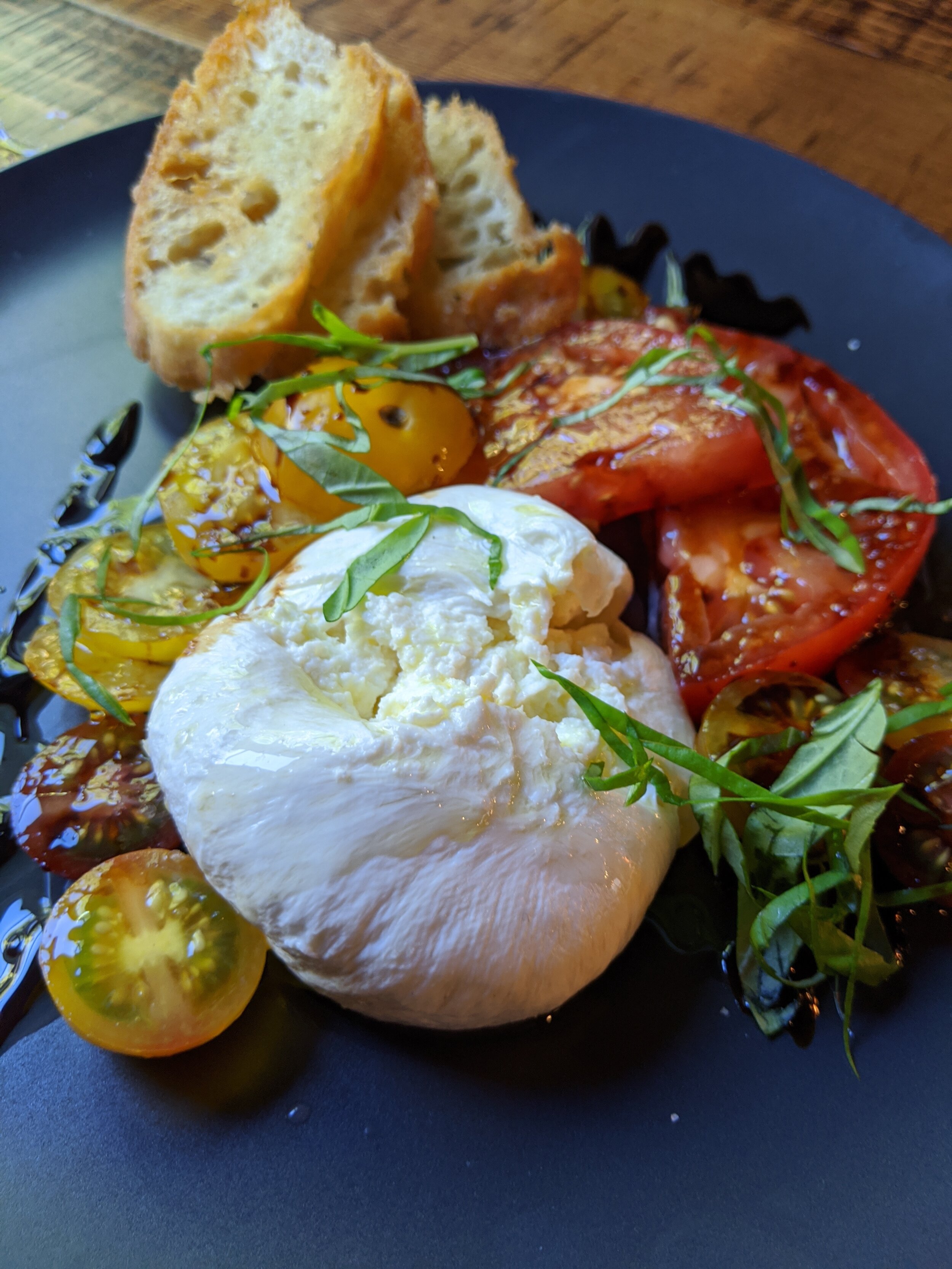 Burrata - Nine times out of ten, if burrata is on the menu, I’ll order it. So glad i did. This is the best sharing dish. Heirloom tomatoes, fresh basil finished with balsamic glaze and Maldon sea salt and served with crostini.